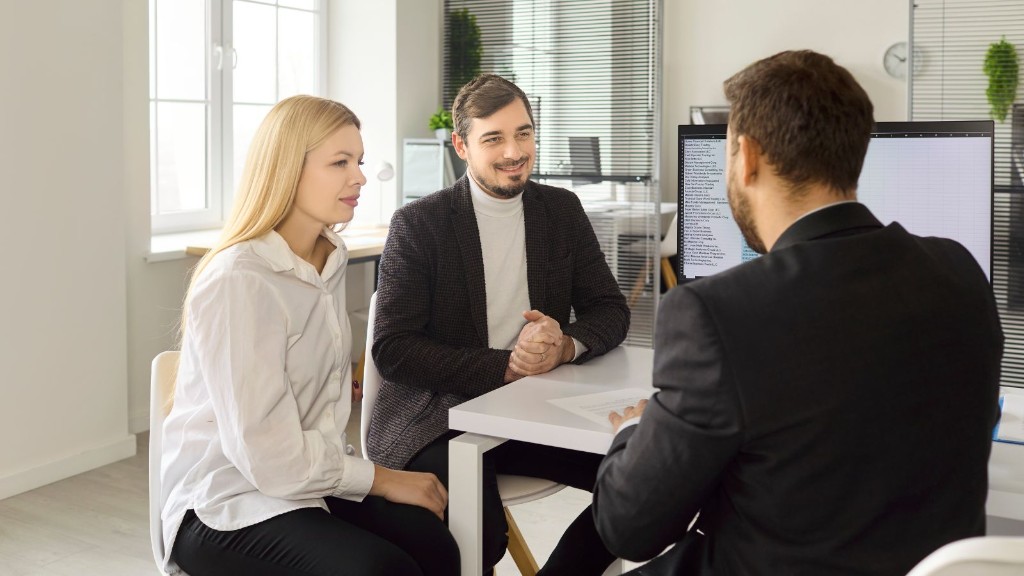 Couple meeting with an immigration consultant
