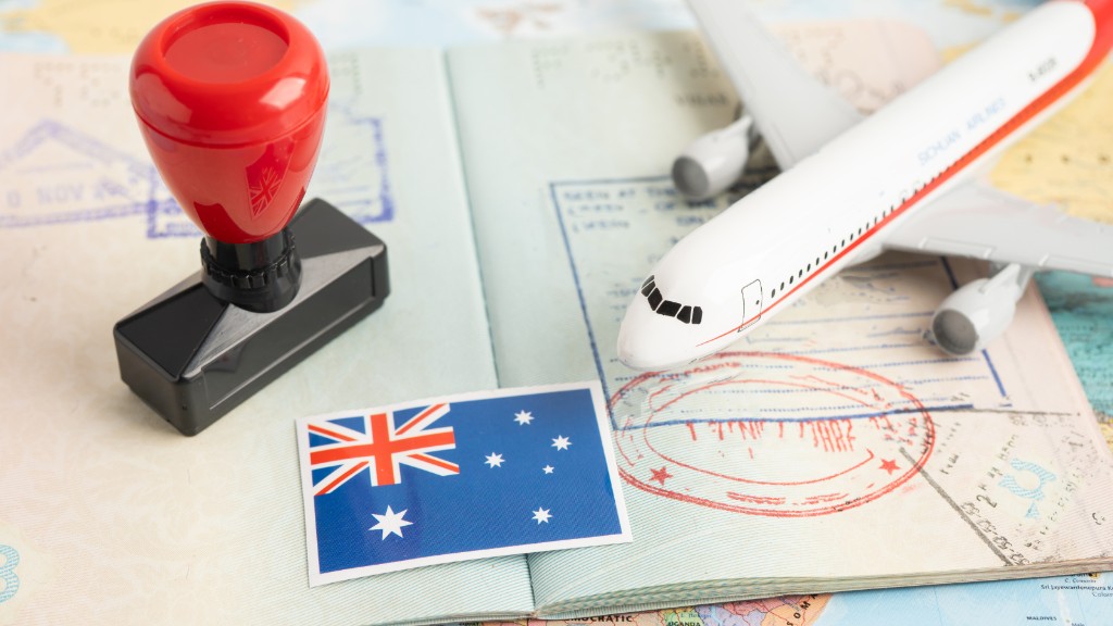 Passport, stamps and Australian flag