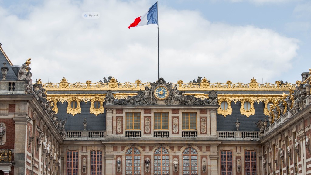 Palace of Versailles with the French flag