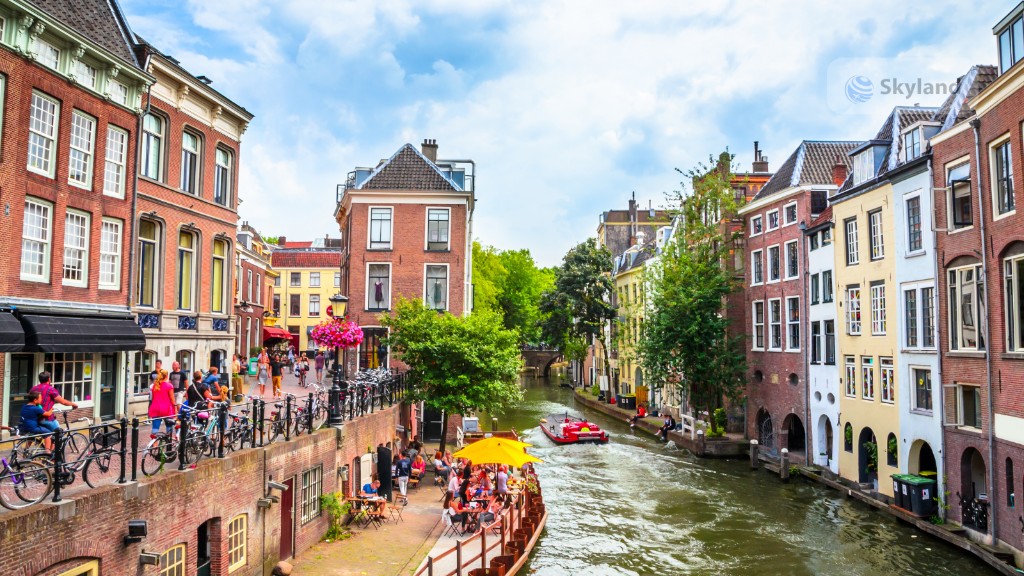 Amsterdam canal houses reflecting in the water