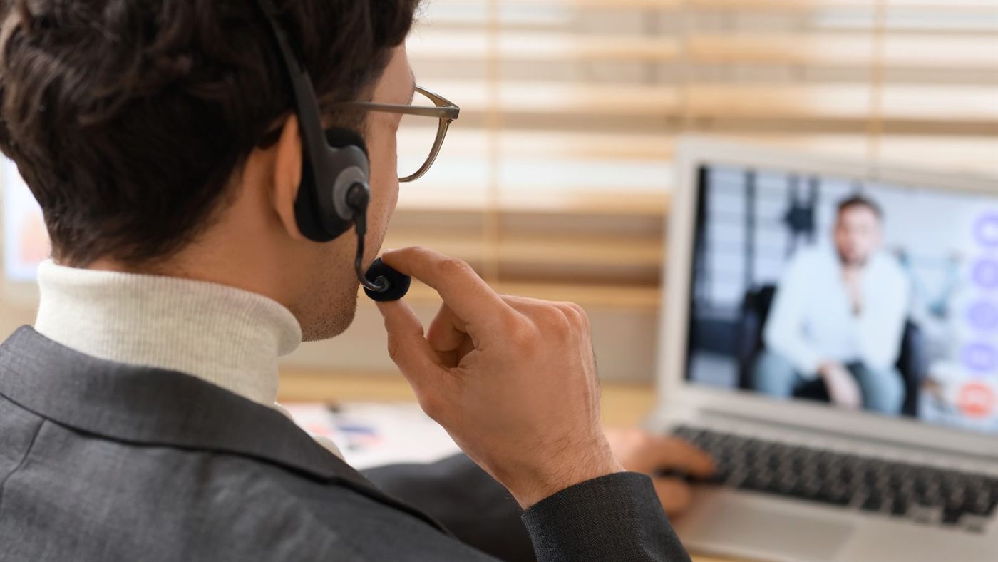 Consultant on a video call with a client
