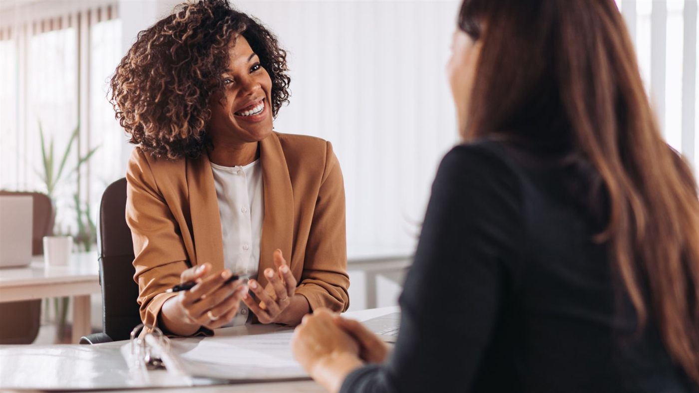 Immigration consultant meeting with a client