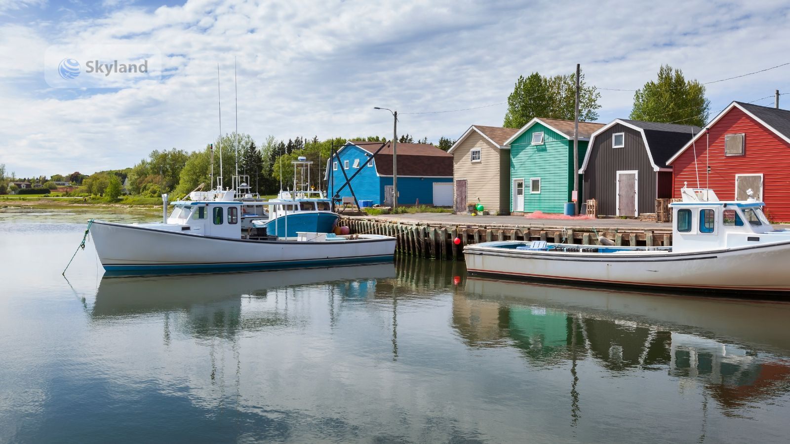 Colourful fishing sheds along a Prince Edward Island harbour