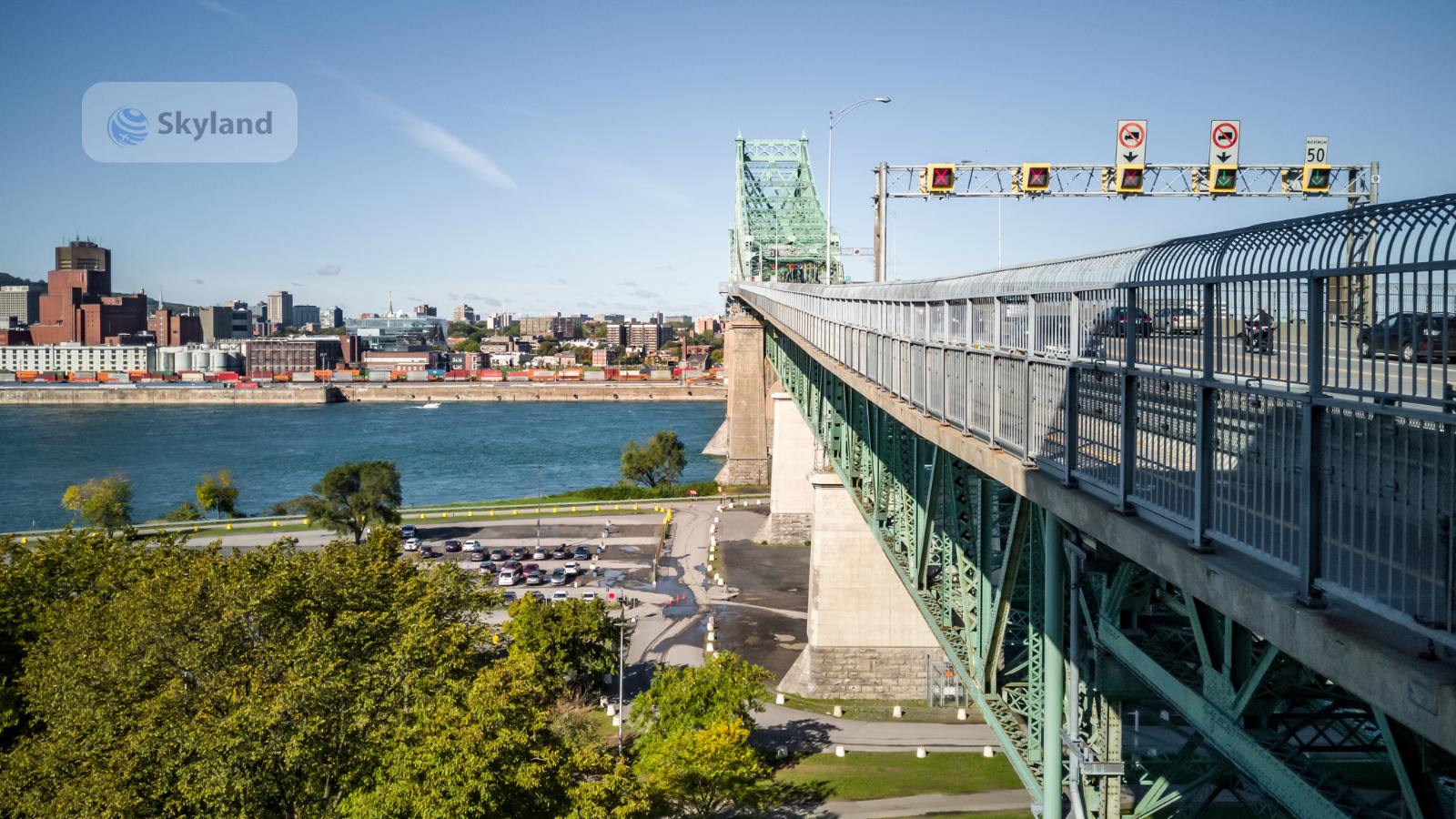 Quebec flags flying from historic buildings