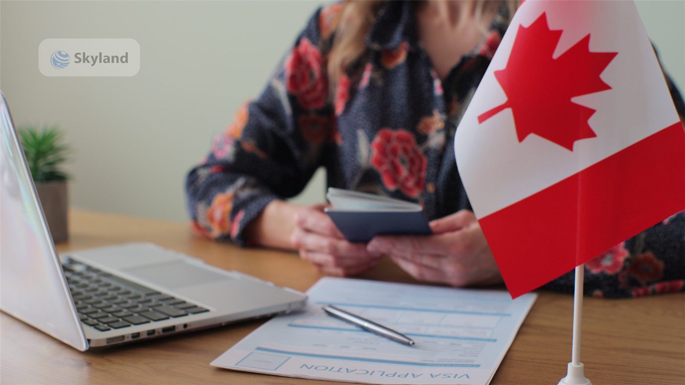 Completing a Canadian visa application with a passport