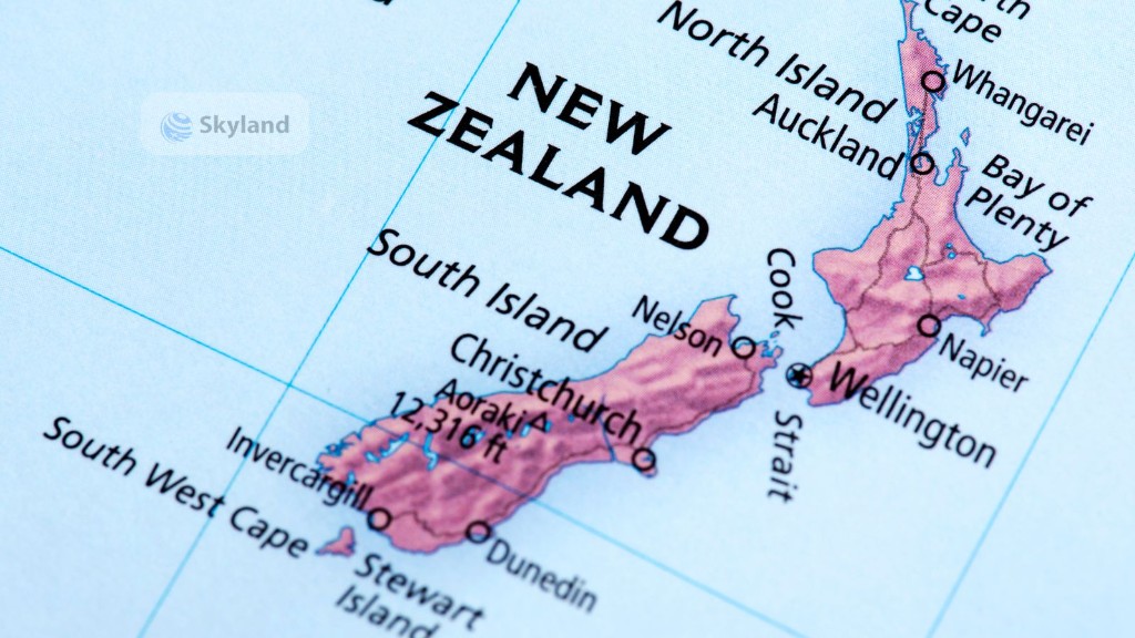 Map of New Zealand with a flag pin at Wellington