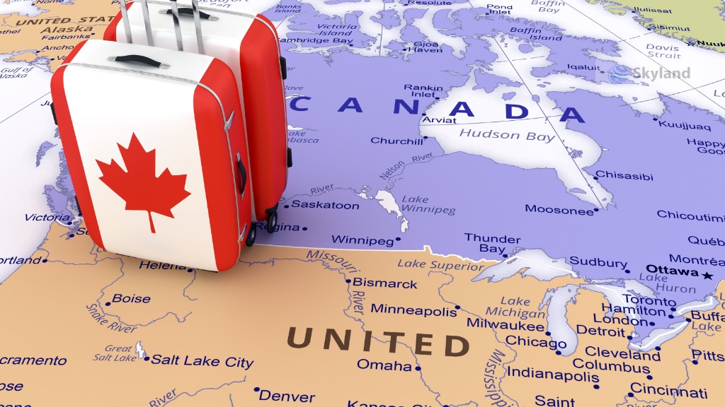 Canadian-flag suitcase on a map of Canada