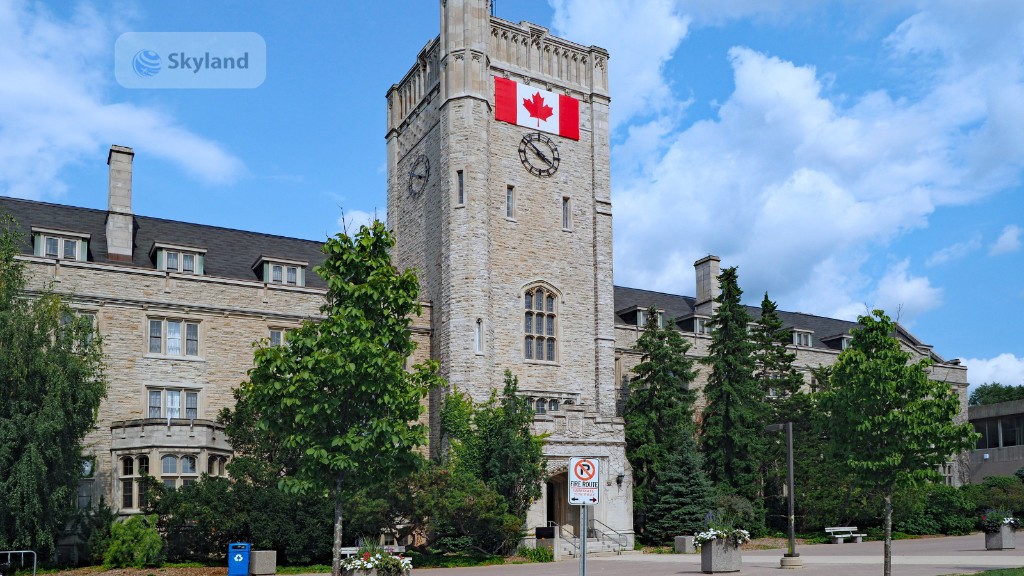 Canadian university clock tower with the national flag