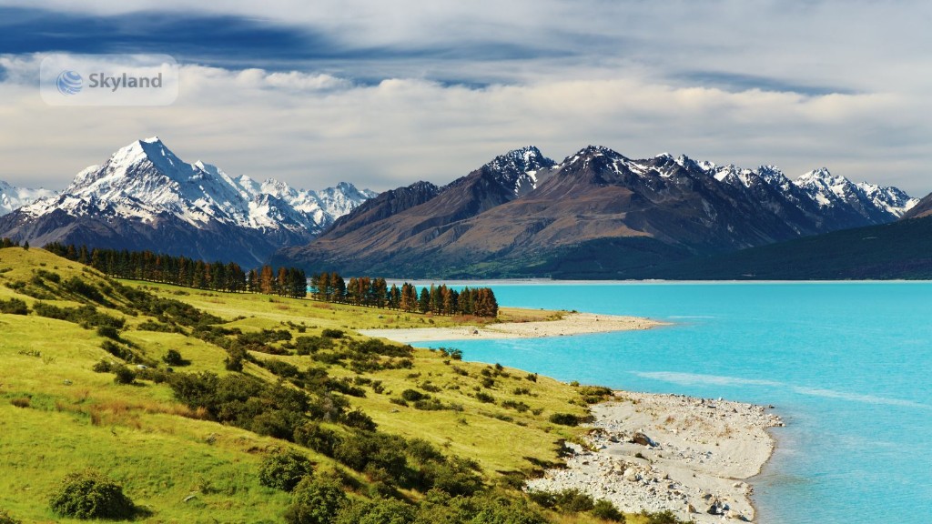 Turquoise glacial lake and snow-capped mountains in New Zealand